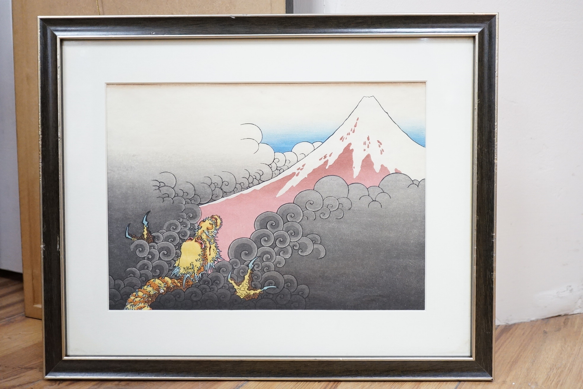 A set of ten Japanese woodblock prints to include ‘Great wave off the coast of Kanagawa’, ‘Fishermen at Kajikazawa’ and ‘Evening shower’, largest 25 x 36cm. Condition - fair